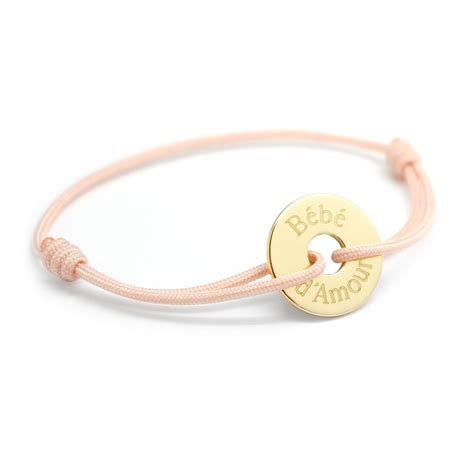 Bracelet cordon médaille ajourée plaqué or gravure BEBE D AMOUR