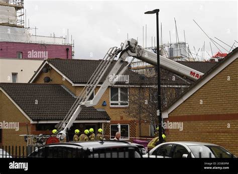 Emergency Personnel At The Scene In Bow East London Where A 20 Metre