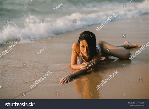 Sexy Asian Woman Wearing White Bikini Shutterstock