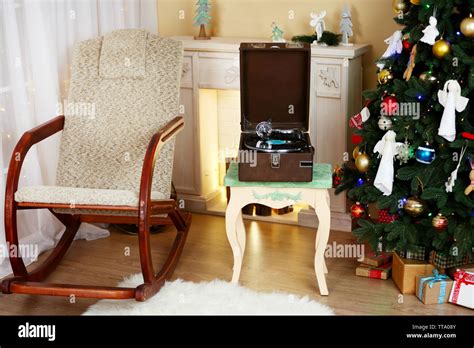 Beautiful Christmas Interior With Fireplace Turntable And Fir Tree