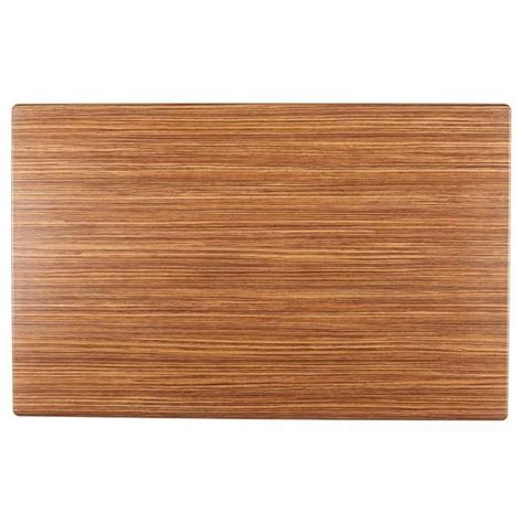 A Wooden Cutting Board With Some Brown Wood Grains On The Top And