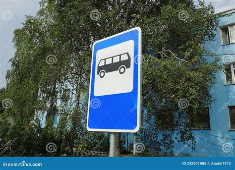 Road Sign Bus Stop On A Background Of Green Vegetation Stock Image