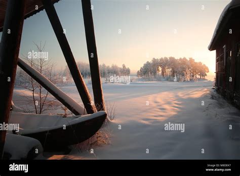 Winter Sunset At Lake Menstraesket In Vaesterbotten Sweden Stock Photo