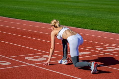 Premium Photo Girl Getting Ready At Starting Position Line For Sprint