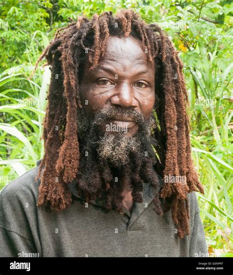 Portrait Of A Local Man With Long Reddish Colored Dreadlocks On His