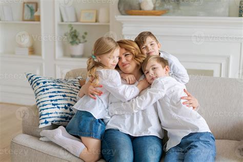 Cute kids hugging, excited mom showing love and affection, smiling mother 13181224 Stock Photo ...