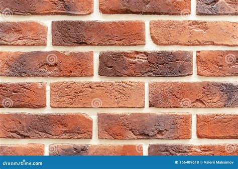 Brick Wall Of Red And Brown Bricks Background And Texture Of Brickwork