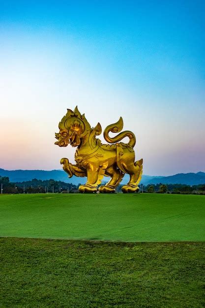 Premium Photo A Beautiful View Of Golden Singha Statue In Singha Park