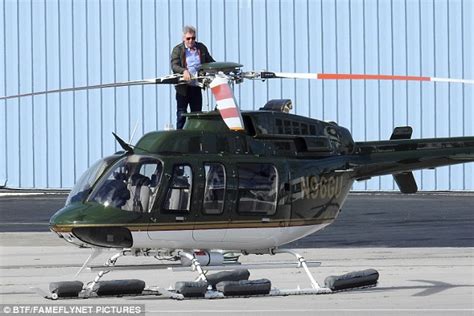 Harrison Ford Hops On Helicopter Roof To Check It Out Daily Mail Online