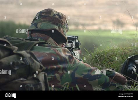 British army sniper team with his L115A3 sniper rifle, training in ...