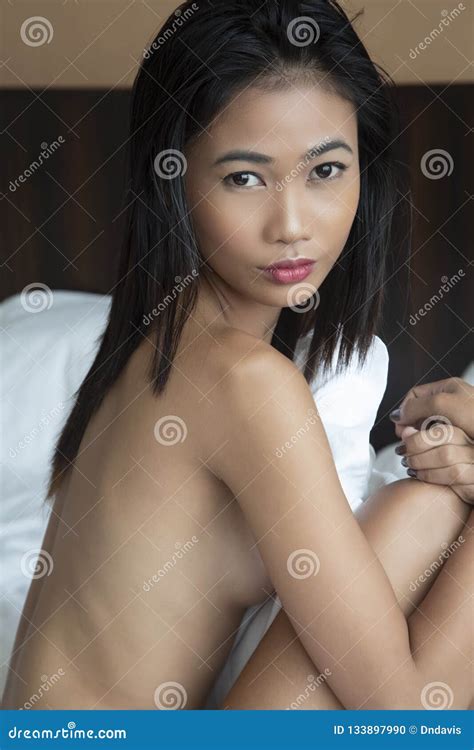 Beautiful Asian Woman Posing Nude On White Sheets Stock Photo Image