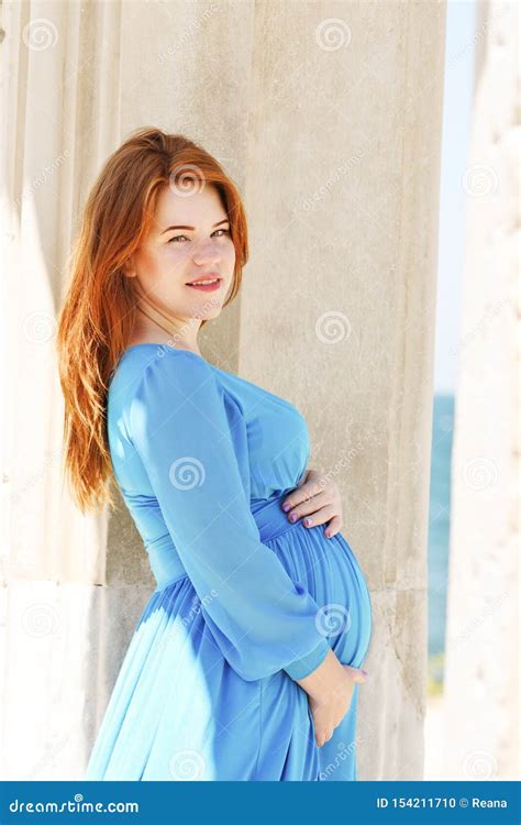 Pregnant Redhead