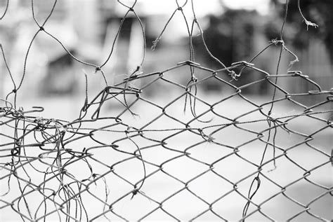 Premium Photo Close Up Of Broken Chain Link Fence