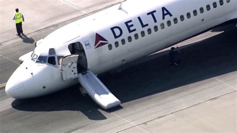 Delta Passengers Exit Flight Using Jet Slide After Plane Lands Without Front Gear Extended