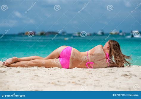 Woman Wearing Pink Bikini Laying On Beach Stock Image Image Of