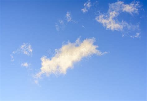 Puffy Clouds Against Blue Sky Wallpaper Background Stock Photo Image