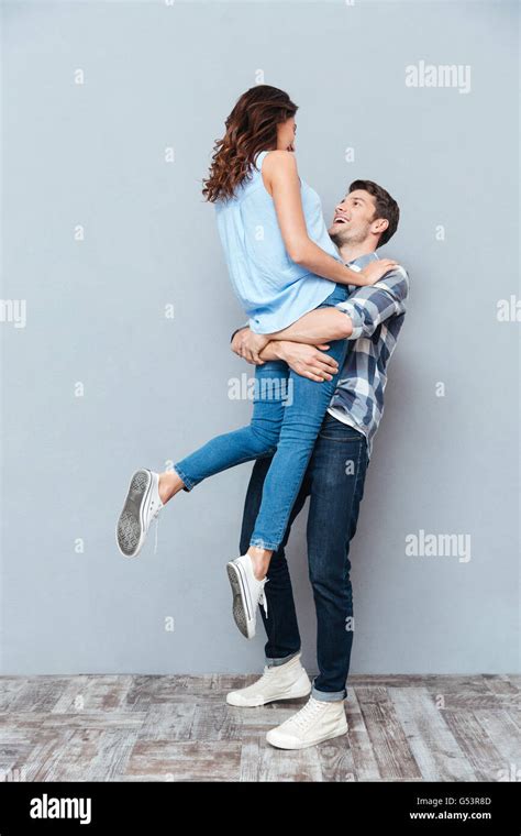 Man Lifting Up Girlfriend Isolated Hi Res Stock Photography And Images