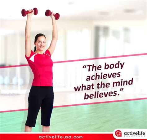 A Woman Holding Two Dumbbells In Front Of Her Face With A Quote On It