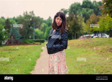 Woman walking alone hi-res stock photography and images - Alamy