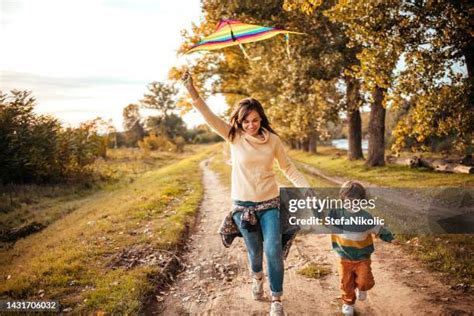 623 Family Flying Kite Park Stock Photos, High-Res Pictures, and Images ...