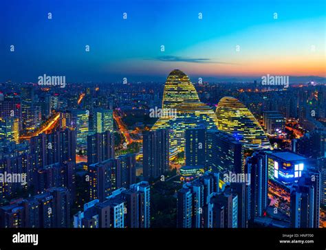 Wangjing Beijing SOHO city building night view Stock Photo - Alamy