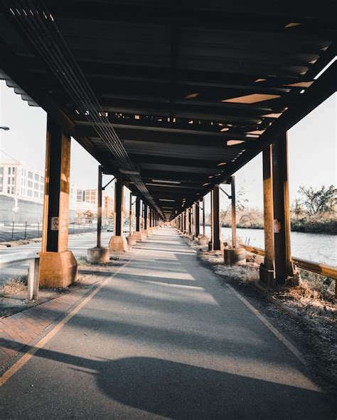 Premium Photo Empty Road Along Bridge