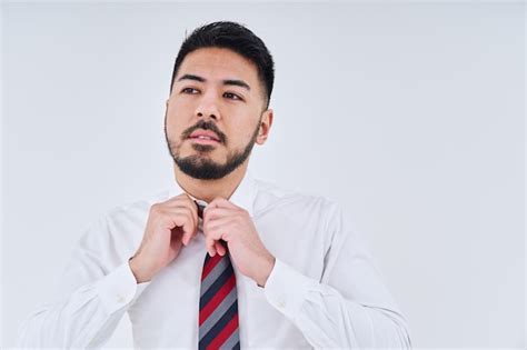 Premium Photo Business Man Adjusting His Tie