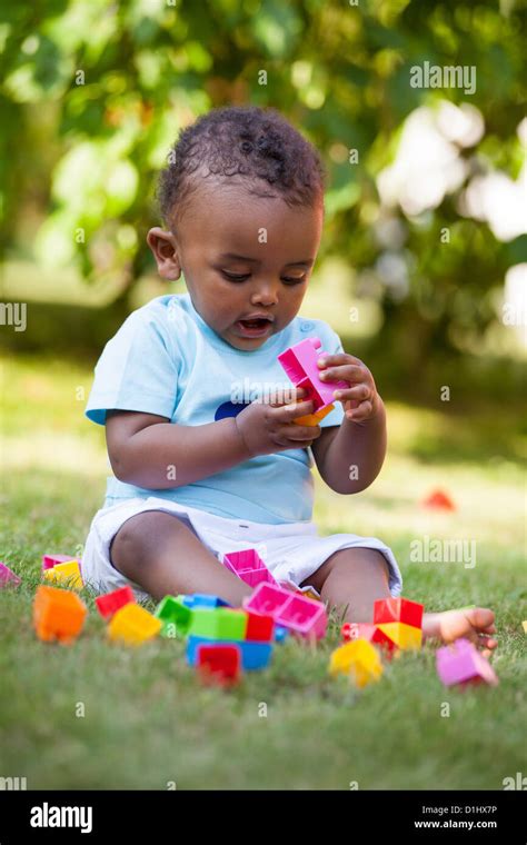 Portrait Of A Little African American Baby Boy Playing Outdoor In The