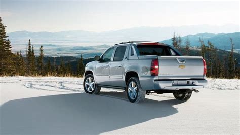 The 2013 Chevy Black Diamond Avalanche Suv Truck In Silver Ice Metallic