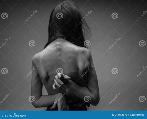 Nude Woman In Black And White Photo Gesturing With Hands Back View Stock Image Image Of Clean