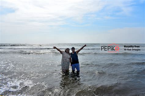 Young couple enjoying at GOA beach - pepiko