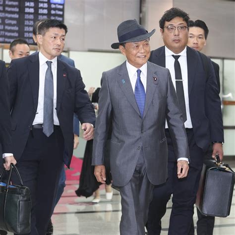 Former Japanese prime minister Taro Aso arrives in Taiwan to give ...