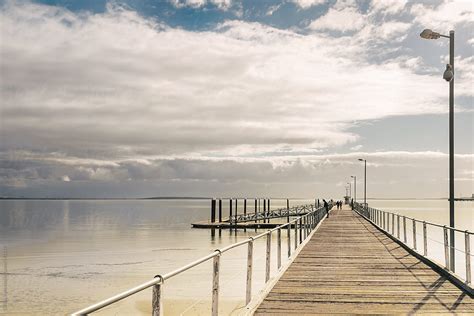 Empty Jetty Leading To The Sea Del Colaborador De Stocksy Gillian