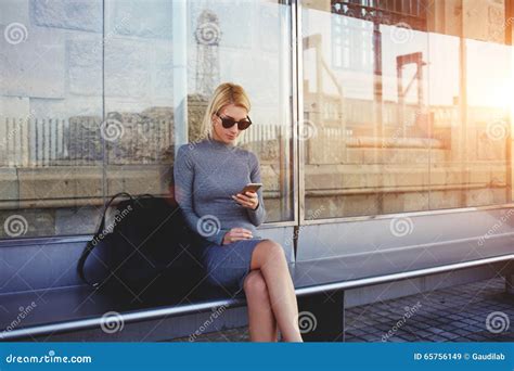 Stylish Hipster Girl Chatting In Network Via Smart Phone With Her