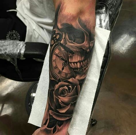 Forearm Skull And Roses Tattoos