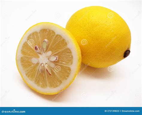 A Slice And Full Yellow Lemon Isolated In White Background Stock Image