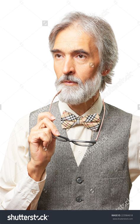 Portrait Of Thoughtful Senior Caucasian Man With A Gray Beard And