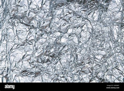 Silver Shiny Crumpled Foil Texture Background Top View Stock Photo Alamy