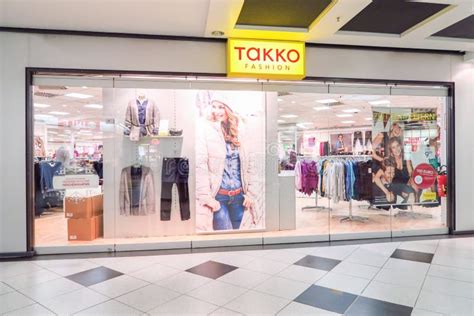 Takko Fashion Logo On A Flag In Front Of Their Local Store Takko Is A