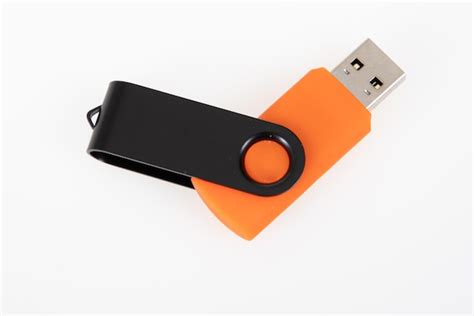 Premium Photo Black Orange Usb Memory Flash Drive On White Background