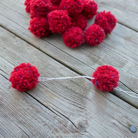 How To Make An Easy Pom Pom Garland Diy With A Fork Sustain My