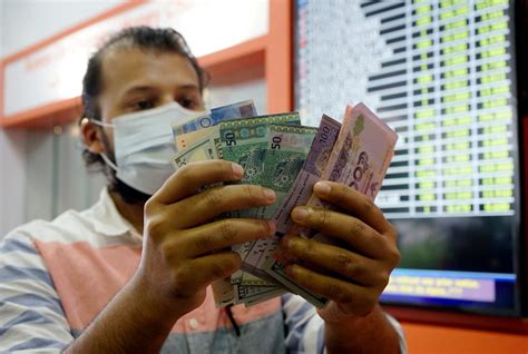 Ringgit Opens Marginally Lower Against US Dollar