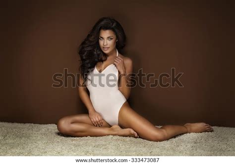 Sensual Brunette Lady Sitting On Carpet Stock Photo 333473087 Shutterstock