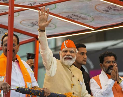 Modi Takes Out Mega Roadshow In Bengaluru Rediff India News