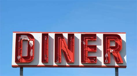 Download Retro Diner Aesthetics With Neon Lights And Vintage Interior