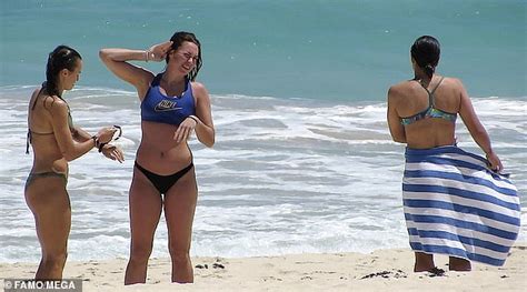 Sam Kerr hits the beach as Matildas relax after win over the ...