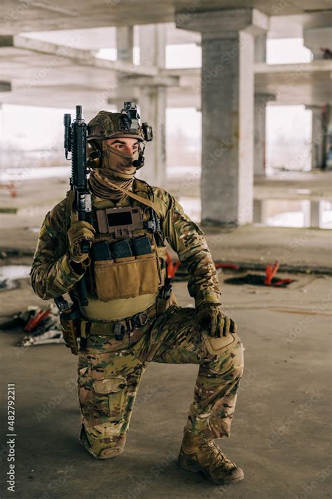 Special Forces Operator Wearing Multicam Uniform And His Assault Rifle