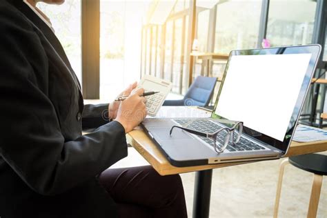 Close Up Of Accountant Woman Using Calculator For Her Work With Stock