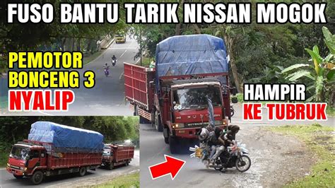 Truk Fuso Bantu Tarik Truk Nissan Mogok Hampir Tubruk Pemotor Bonceng