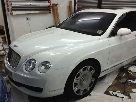 Bentley Flying Spur Wrapped White by Wrapping Cars London